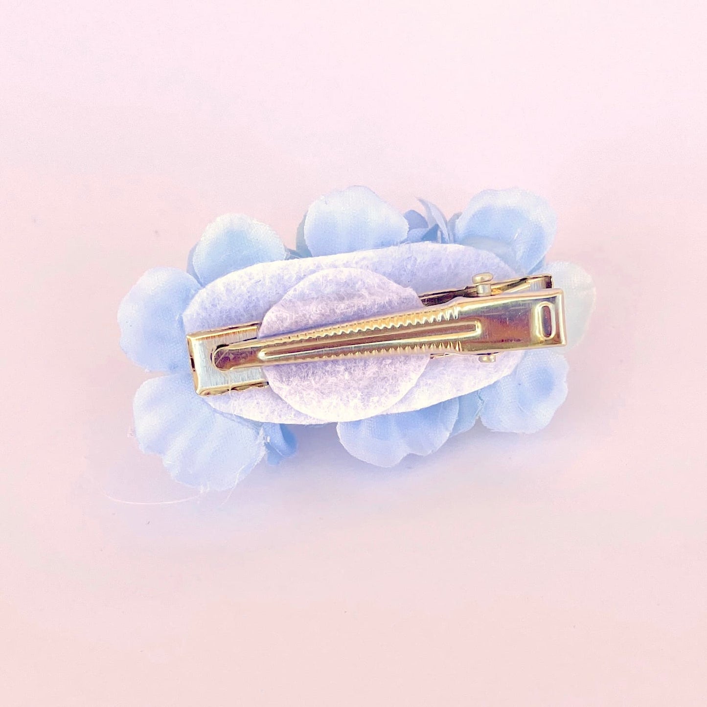 Clipe de 3 flores - azul claro