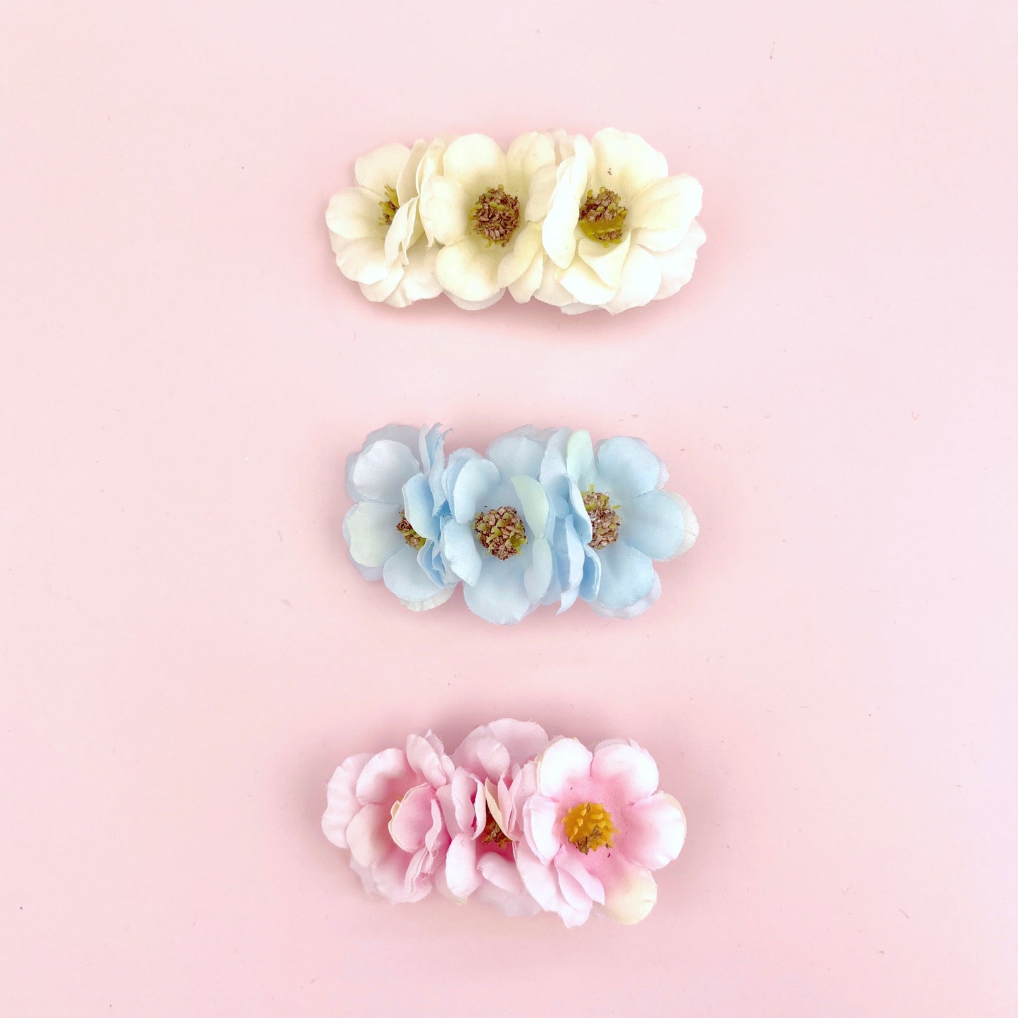 Clipe de 3 flores - cru
