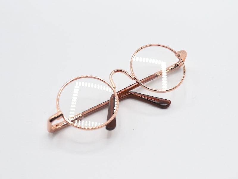 Gafas de juguete en color dorado para muñeca