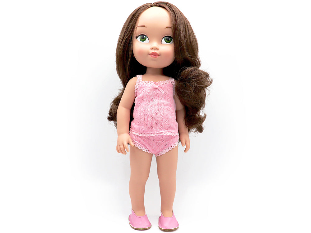 Muñeca morena de pelo largo y ojos verdes