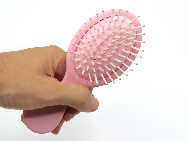 Cepillo rosa para el pelo antitirones niña y muñeca